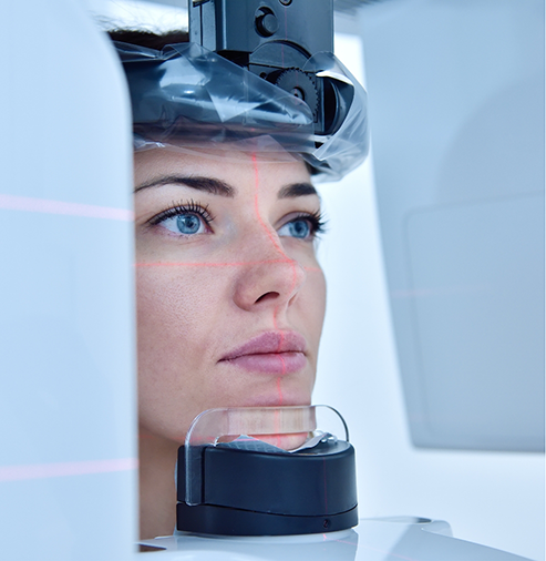 Woman getting x-rays of her mouth taken