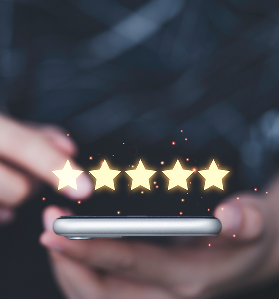 Person leaving a five-star review on their phone